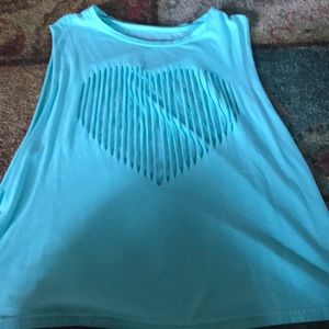Black tank top with a ripped blue heart